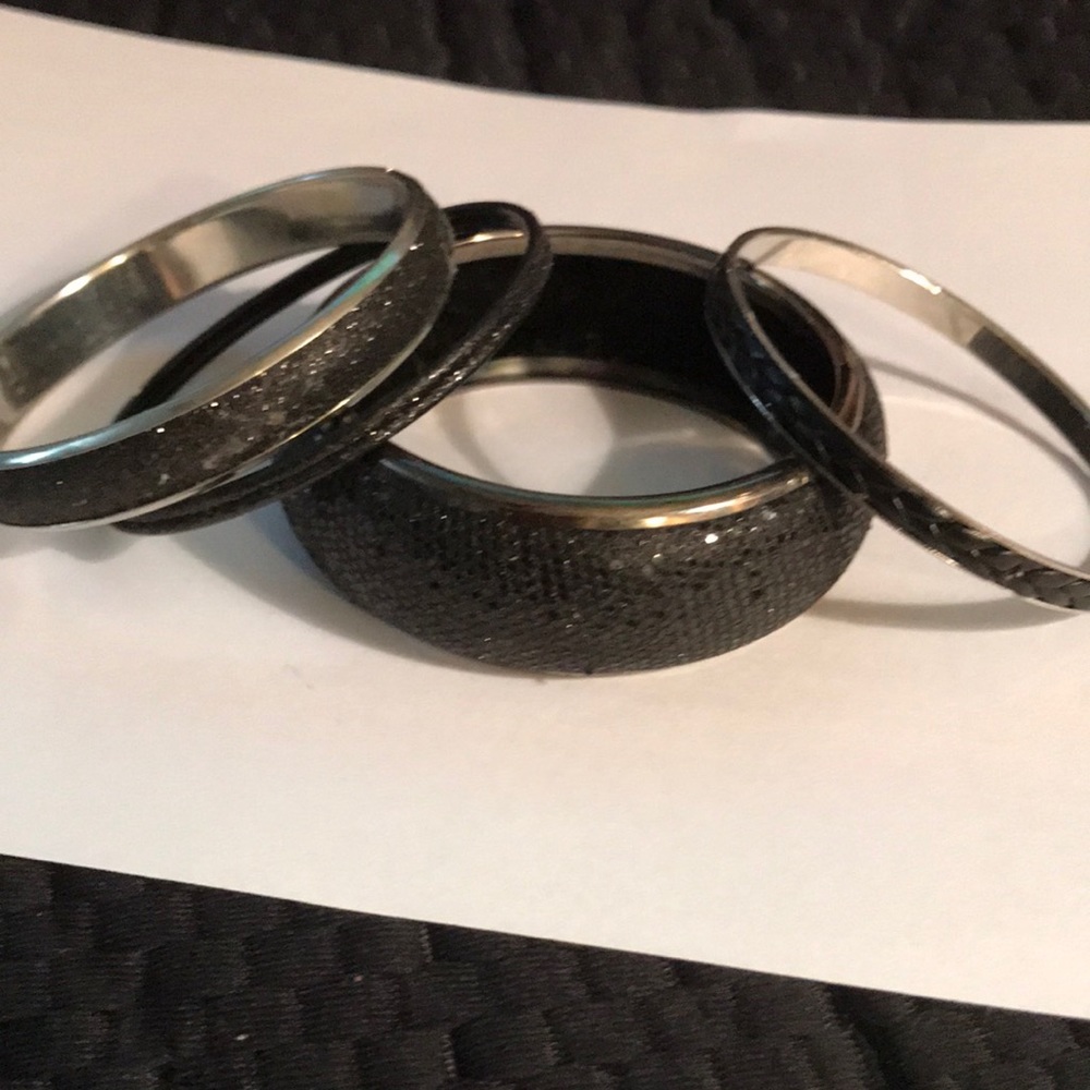 Set of 4 black and silver bracelets